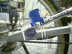Figure C1 - Series 160 position transducer monitoring rear shock displacement on mountain bike.