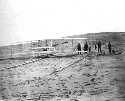Readying the Wright Flyer for its first flight on December 14, 1903.